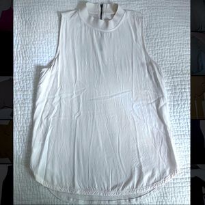 Off-white sleeveless mock turtleneck blouse